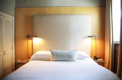 Postel nebo postele na pokoji v ubytování Mill Street Inn