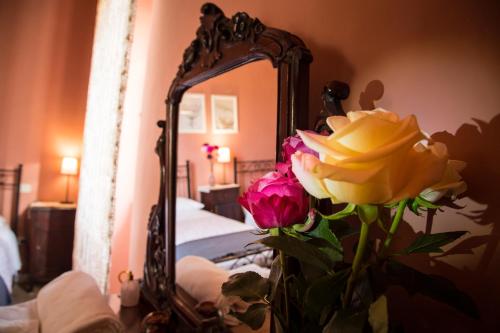 Postel nebo postele na pokoji v ubytování B&B I Due Gelsi