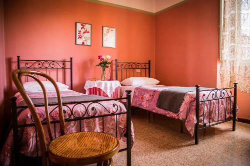 Postel nebo postele na pokoji v ubytování B&B I Due Gelsi
