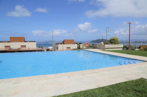 Swimming pool sa o malapit sa Inmejorables vistas a las islas Cies