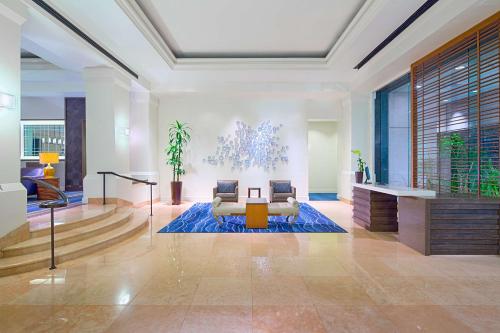a living room with a couch and a table at Grand Hyatt Tampa Bay in Tampa