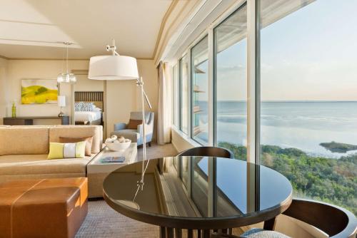 a living room with a view of the ocean at Grand Hyatt Tampa Bay in Tampa
