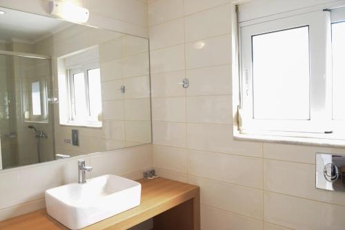 Ένα μπάνιο στο Mithos Premium Rooms