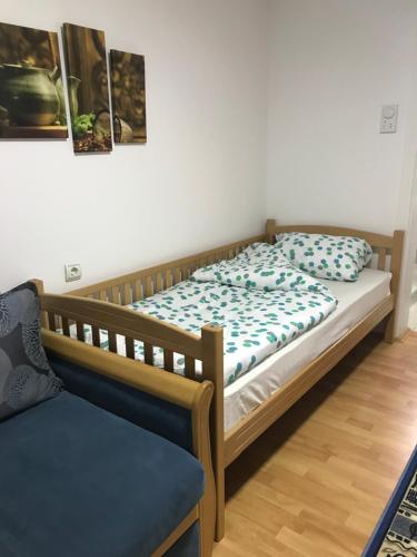 Postel nebo postele na pokoji v ubytování Apartmani Stojanovic