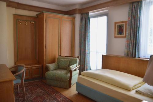 Postel nebo postele na pokoji v ubytování Hotel Das Schlössl