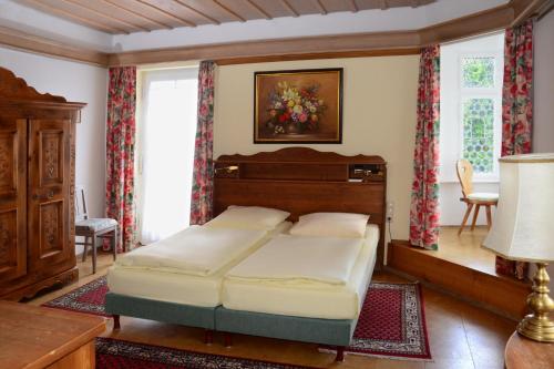 Postel nebo postele na pokoji v ubytování Hotel Das Schlössl