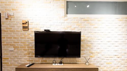 TV a/nebo společenská místnost v ubytování Mi Jing Shih Guang