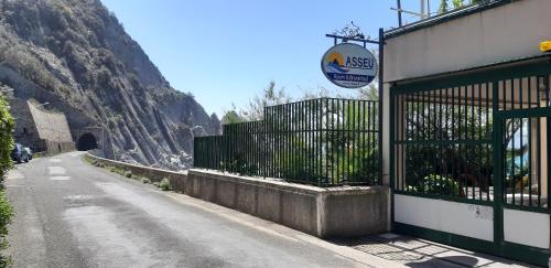 a building on the side of a road with a tunnel at Asseu in Sestri Levante