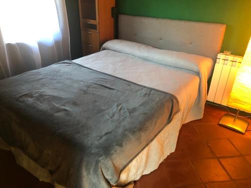 Postel nebo postele na pokoji v ubytování Casa rural De Añil - Jardín privado