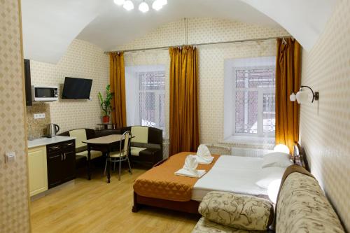 Postel nebo postele na pokoji v ubytování Hotel Nevsky 111
