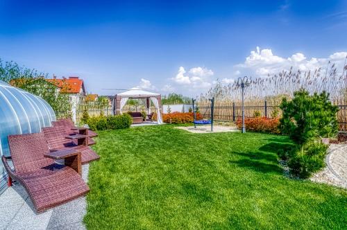 Κήπος έξω από το Perla Mare Apartamenty