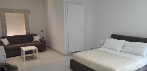 Katil atau katil-katil dalam bilik di Italiana Resort Atrio