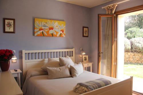 Postel nebo postele na pokoji v ubytování B&B Il Giardino