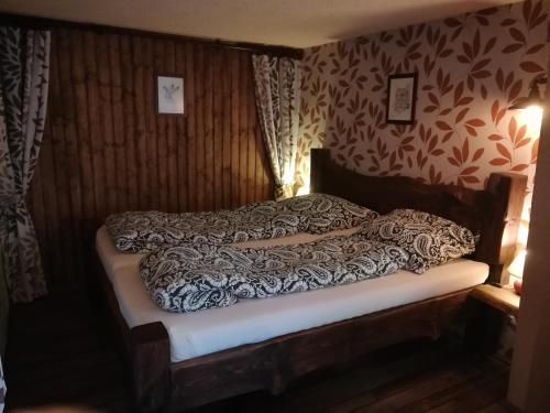 Postel nebo postele na pokoji v ubytování Isabellental - Blacksmithing