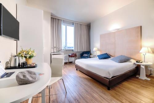 Postel nebo postele na pokoji v ubytování Hotel Oro Blu