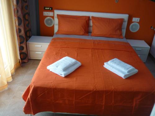 Postel nebo postele na pokoji v ubytování Guesthouse Zografia