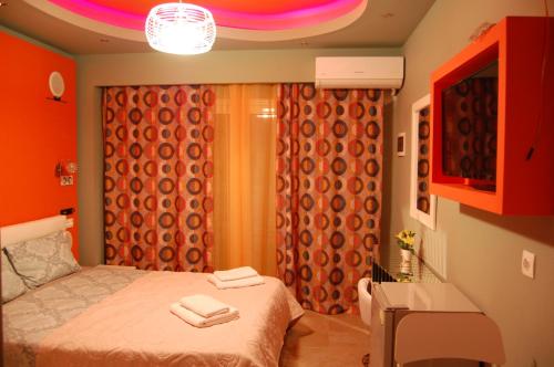 Postel nebo postele na pokoji v ubytování Guesthouse Zografia