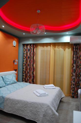 Postel nebo postele na pokoji v ubytování Guesthouse Zografia