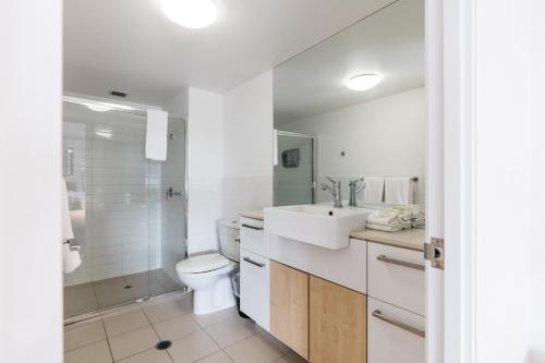 Ванная комната в Gabba Central Apartments