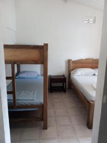 Voodi või voodid majutusasutuse Hostel Blue Sea Rincon del Mar toas
