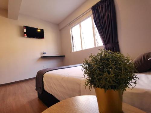 TV a/nebo společenská místnost v ubytování The Core Hotel