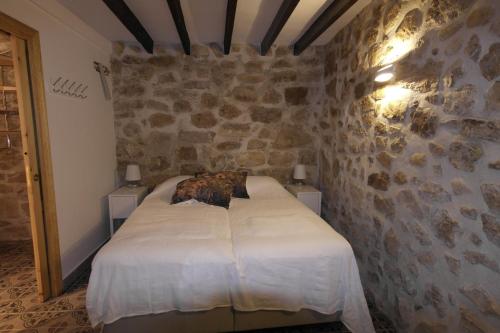 En eller flere senge i et værelse på CAS, El Castell