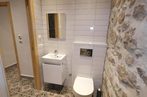 Et badeværelse på CAS, El Castell