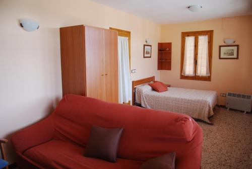 Giường trong phòng chung tại CASA LACAMBRA