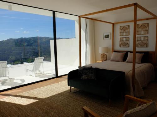 Postel nebo postele na pokoji v ubytování Casa de S. Brás