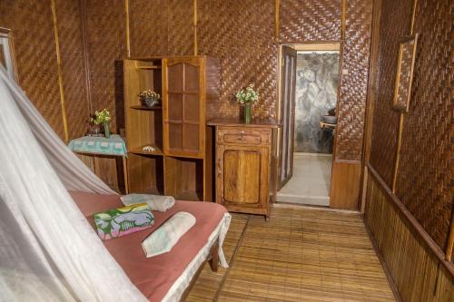 Posteľ alebo postele v izbe v ubytovaní Bunaken Divers Sea Breeze Resort