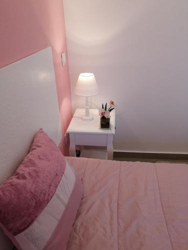 Ένα ή περισσότερα κρεβάτια σε δωμάτιο στο Sensations Guesthouse
