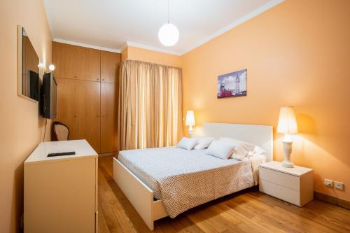 Postel nebo postele na pokoji v ubytování Miramar Apartment with pool by HR Madeira