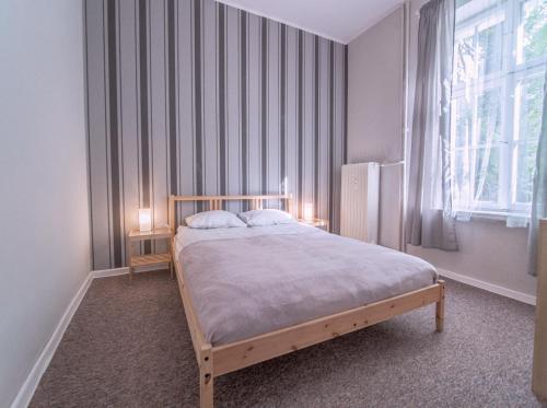 Postel nebo postele na pokoji v ubytování Apartament Staroofka
