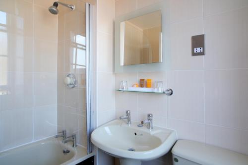 A bathroom at Carlisle Station Hotel, Sure Hotel Collection by BW