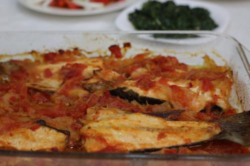 a dish of food with a spatula in it at Vila Korani in Tirana