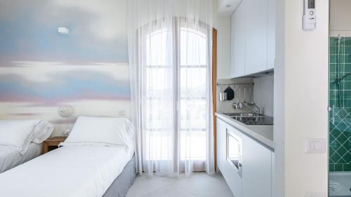 Katil atau katil-katil dalam bilik di Italianway - Locanda della Meridiana
