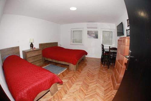 Posteľ alebo postele v izbe v ubytovaní Apartman Kupa