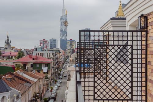 a view of a city street with buildings at Hotel BLOOM Batumi in Batumi