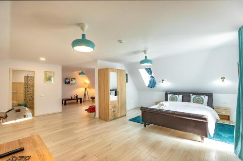 Ένα ή περισσότερα κρεβάτια σε δωμάτιο στο Casa Atanasiu -Adult only