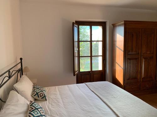 Ένα ή περισσότερα κρεβάτια σε δωμάτιο στο Villa Preselle Country Resort