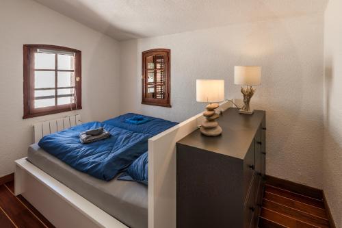 Postel nebo postele na pokoji v ubytování Ferienwohnung „La Cigalerie“