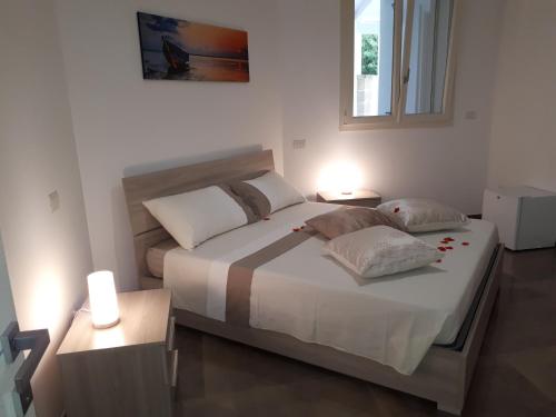 Postel nebo postele na pokoji v ubytování B&B Civico 11