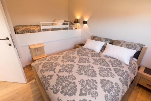 เตียงในห้องที่ Vakantiewoning De Gulden Sleutels