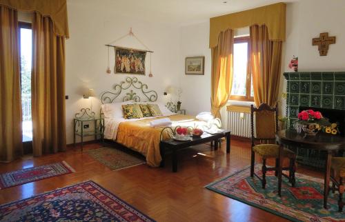 Cama o camas de una habitación en Villa Sant’Uberto Country Inn