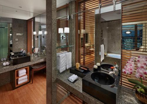 a bathroom with a sink and a counter top at Mandarin Oriental Tokyo in Tokyo