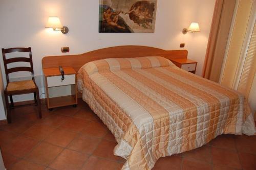 Posteľ alebo postele v izbe v ubytovaní Il Rustico