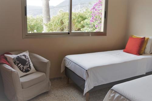 Ліжко або ліжка в номері Casa Aloe
