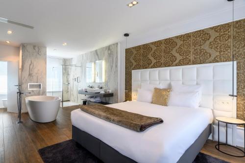 Postel nebo postele na pokoji v ubytování Hotel Rubens-Grote Markt
