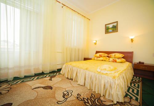 Katil atau katil-katil dalam bilik di Hotel Vinnytsia Sawoy
