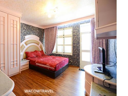 Postel nebo postele na pokoji v ubytování Full House B&B
